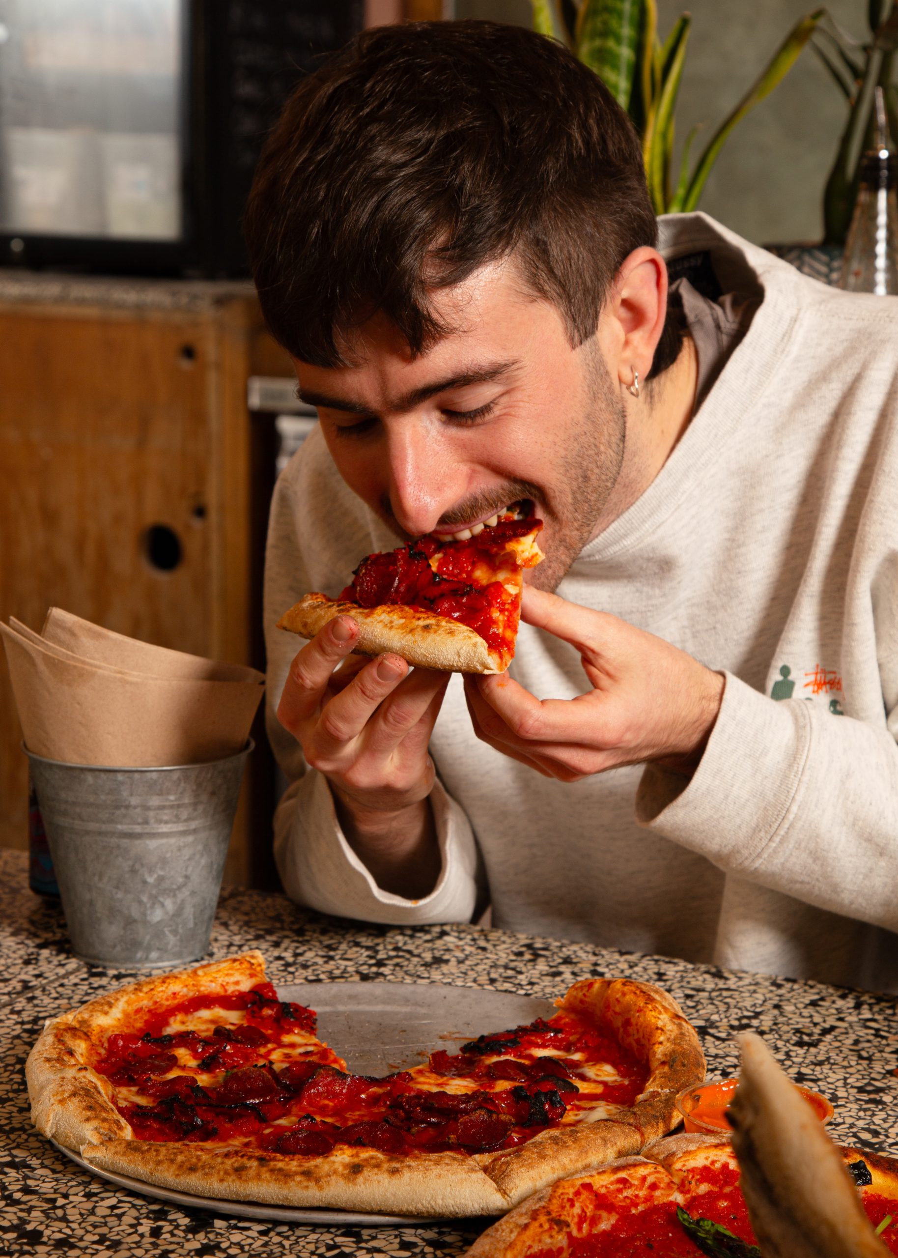 enjoying pizza